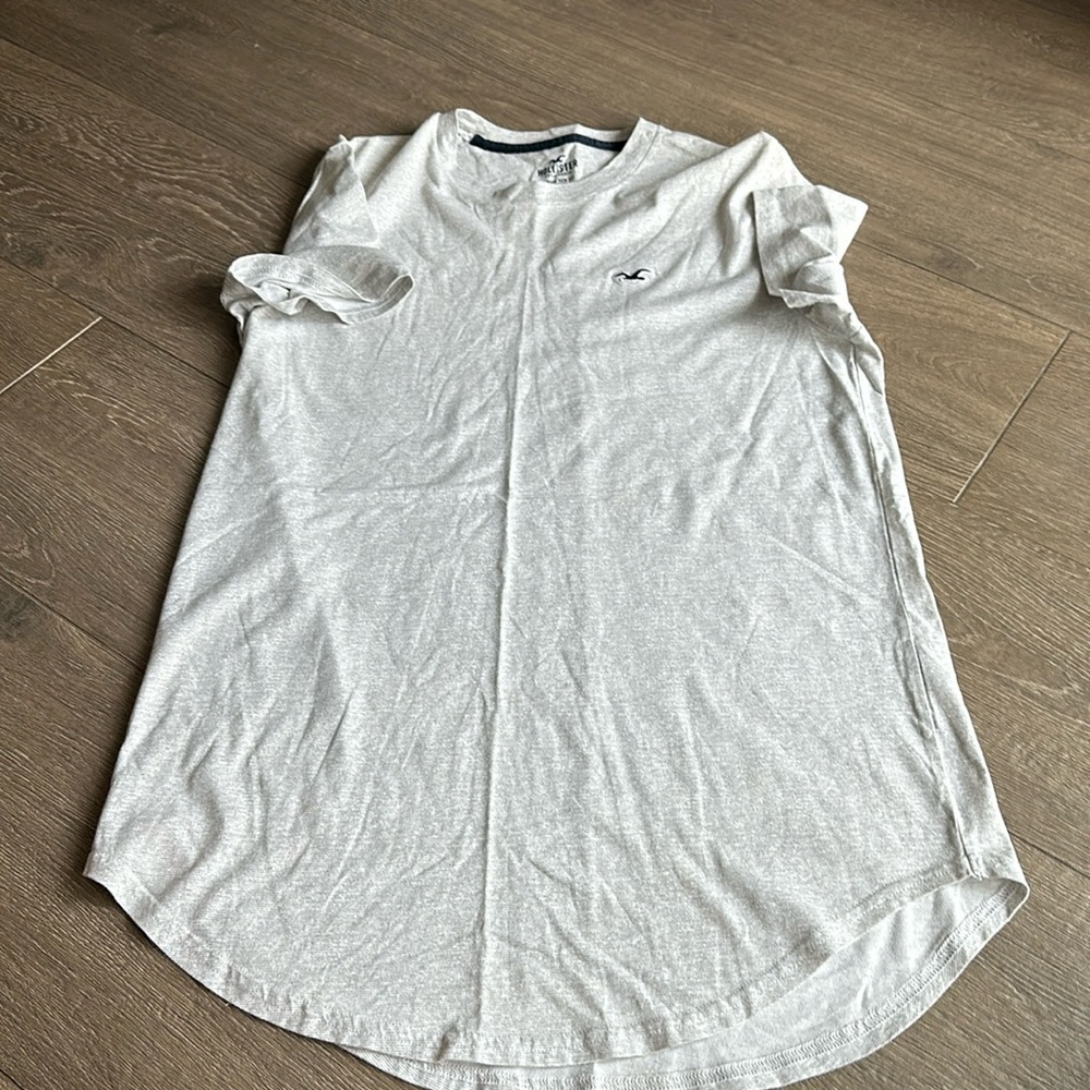 Hollister boys grey tshirt . Curved hem size small